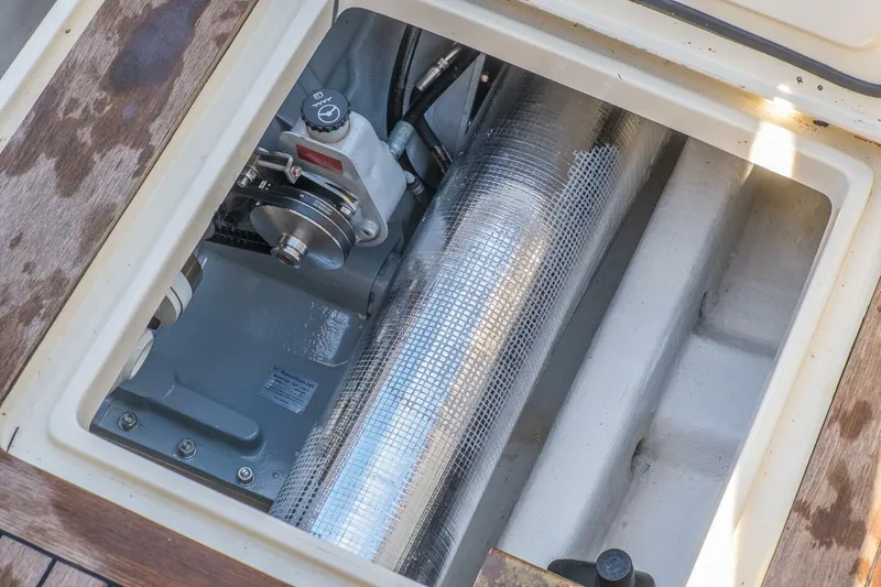 Courage Yacht Photos Pics Engine compartment of a 1998 Hinckley 36 Classic yacht, showcasing mechanical components.