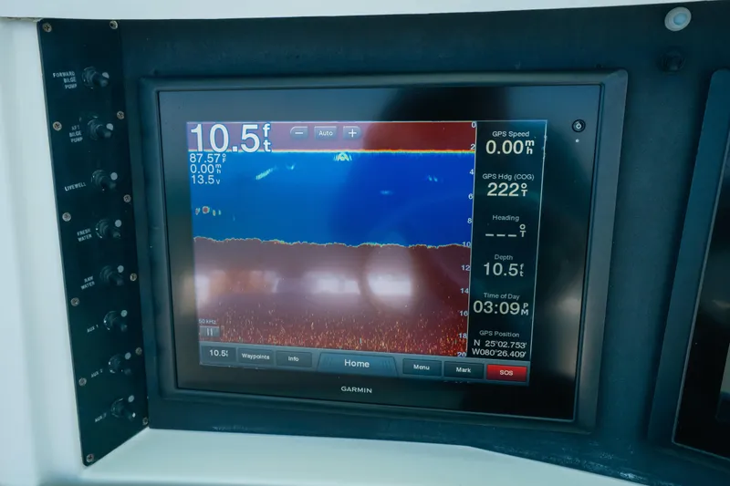  Yacht Photos Pics Boat navigation display showing depth and GPS data on a 2006 Venture 39 Open.