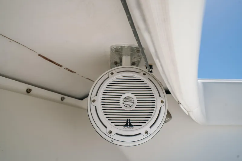  Yacht Photos Pics Boat speaker on a 2006 Venture 39 Open, mounted under a white canopy.