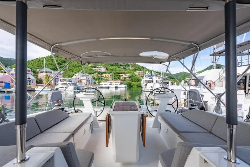 Sunday Girl Yacht Photos Pics Spacious deck of 2024 Beneteau Oceanis 51.1 yacht in a scenic marina.