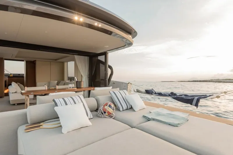  Yacht Photos Pics Luxurious 2024 Azimut Seadeck 7 yacht with elegant outdoor seating and ocean view.