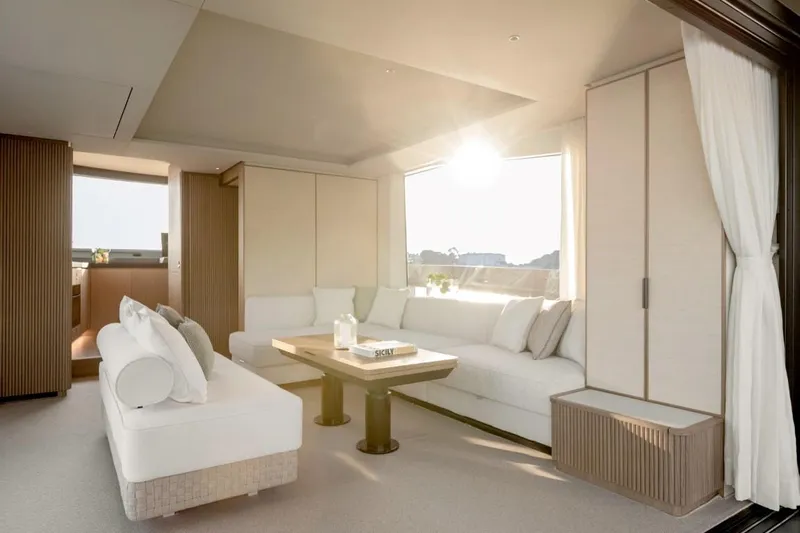  Yacht Photos Pics Luxurious interior of 2024 Azimut Seadeck 7 yacht with elegant seating and natural light.