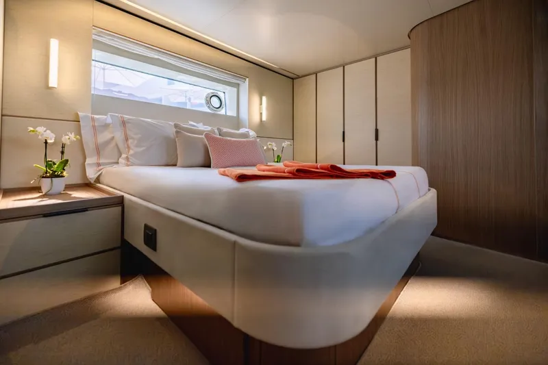  Yacht Photos Pics Luxurious bedroom interior of 2025 Azimut Seadeck 7 yacht with modern design and elegant decor.
