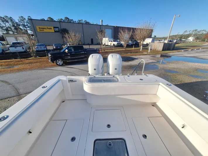 Salt Break Yacht Photos Pics 2020 Contender 32T boat with dual engines, parked near Gregory Poole Marine building.