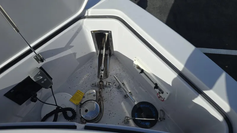  Yacht Photos Pics Bow anchor compartment of 2020 Aviara AV32 OB boat, featuring anchor and winch system.