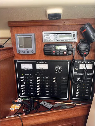 Next Course Yacht Photos Pics Control panel of a 2001 Island Packet 320 sailboat with navigation and communication equipment.