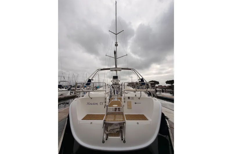 Mary Anne Yacht Photos Pics Sailboat docked under cloudy skies, Hunter 38 model, 2009, Houston, TX.
