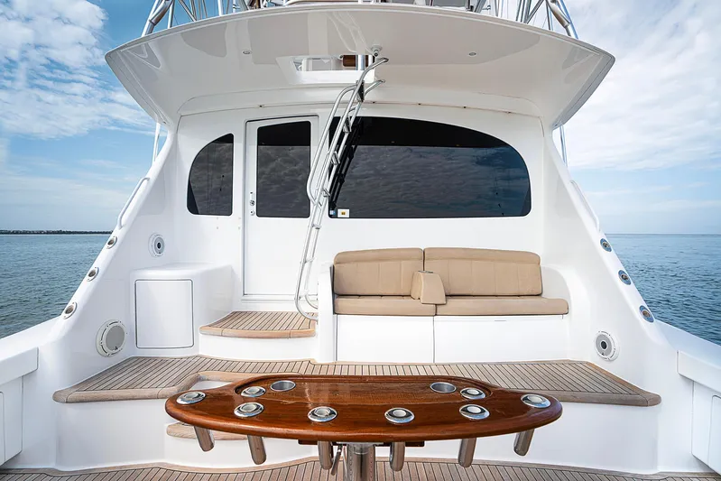 Serenity Now Yacht Photos Pics 2014 Viking 66 yacht deck with seating and ocean view.
