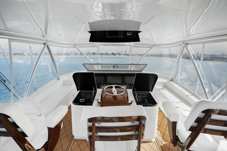Serenity Now Yacht Photos Pics Luxurious 2014 Viking 66 yacht interior with modern helm and panoramic ocean views.