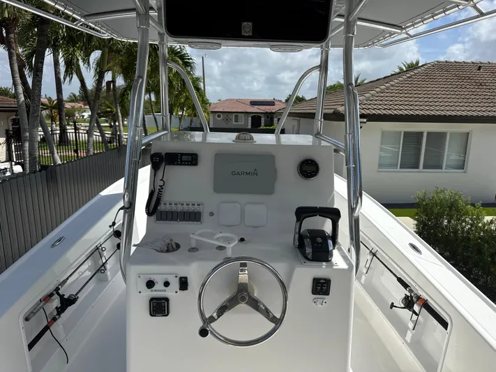  Yacht Photos Pics Center console of a 2015 Ocean Master 296 boat with Garmin navigation system.