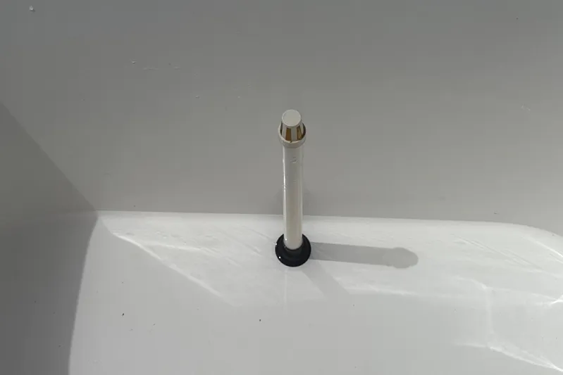  Yacht Photos Pics Close-up of Ocean Master 296 boat component, 2015 model, featuring a white and metallic fixture.