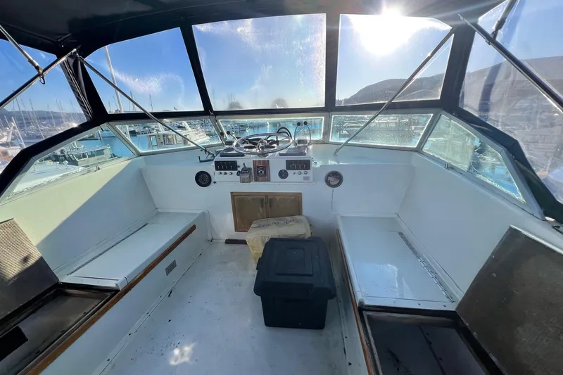 Grand Adventure Yacht Photos Pics 1972 Hatteras 58 Yacht Fisherman helm with panoramic marina view.