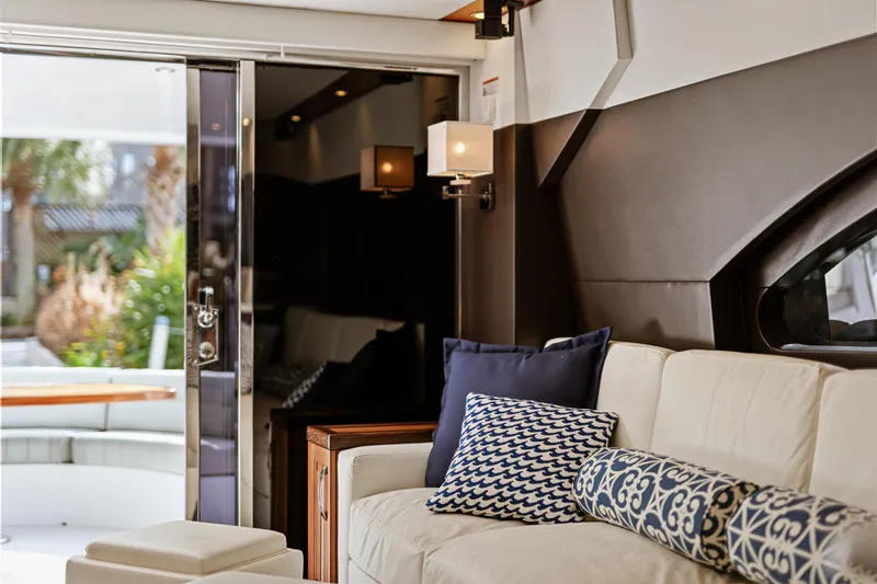 Elsewhere Yacht Photos Pics Luxurious interior of 2013 Hatteras 60 Motor Yacht with elegant seating and decor.