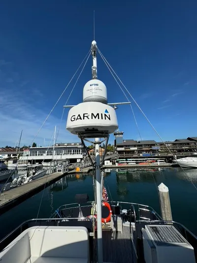  Yacht Photos Pics 1999 Grand Banks 42 Motoryacht with Garmin equipment at marina dock.