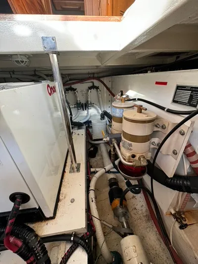  Yacht Photos Pics Engine room of 1999 Grand Banks 42 Motoryacht with visible machinery and components.