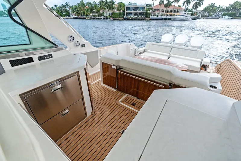Gal Yam 3 Yacht Photos Pics Luxurious 2023 Tiara 48 LS yacht interior with sleek design and waterfront view.