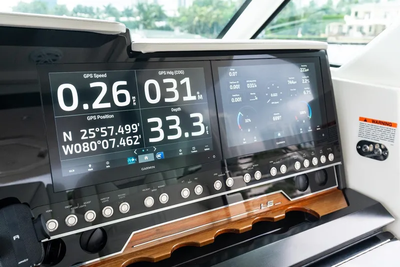 Gal Yam 3 Yacht Photos Pics Dashboard of 2023 Tiara 48 LS yacht with advanced navigation displays.