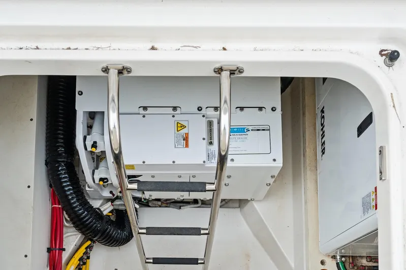 Gal Yam 3 Yacht Photos Pics Engine compartment of 2023 Tiara 48 LS boat with Seakeeper and Kohler equipment.