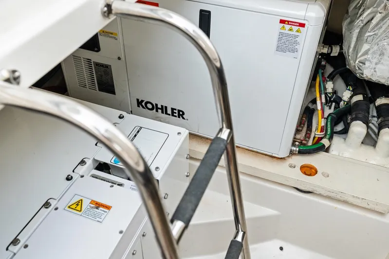Gal Yam 3 Yacht Photos Pics Engine room of 2023 Tiara 48 LS yacht featuring Kohler generator and wiring.