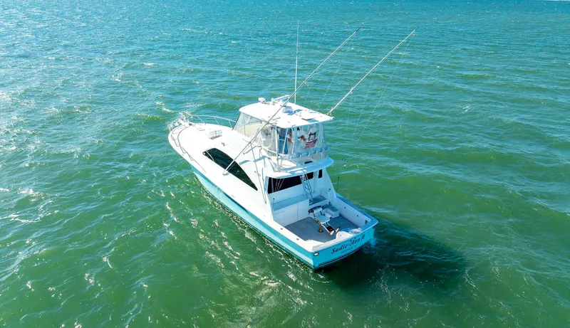 Sadie Ann II Yacht Photos Pics 2005 Ocean Yachts 50 Super Sport cruising on open water.