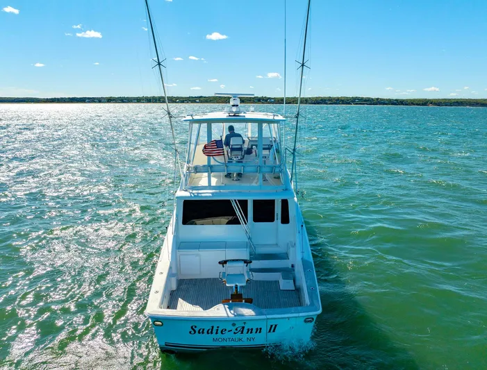 Sadie Ann II Yacht Photos Pics 2005 Ocean Yachts 50 Super Sport cruising on open water under clear skies.