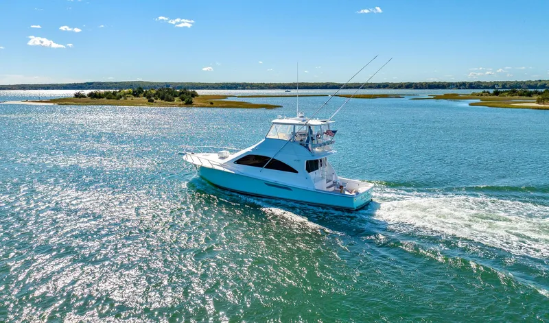 Sadie Ann II Yacht Photos Pics 2005 Ocean Yachts 50 Super Sport cruising on a sunny day.