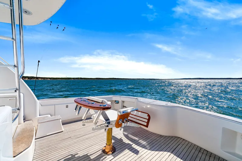 Sadie Ann II Yacht Photos Pics 2005 Ocean Yachts 50 Super Sport on open water, sunny day, spacious deck.