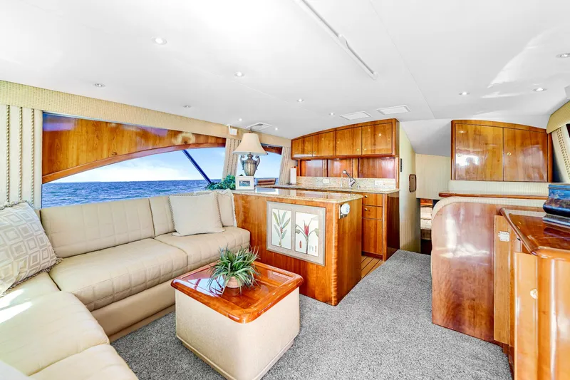 Sadie Ann II Yacht Photos Pics Luxurious interior of 2005 Ocean Yachts 50 Super Sport with elegant wood finishes.