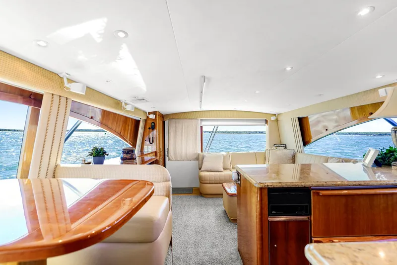 Sadie Ann II Yacht Photos Pics Luxurious interior of 2005 Ocean Yachts 50 Super Sport with elegant furnishings and ocean view.