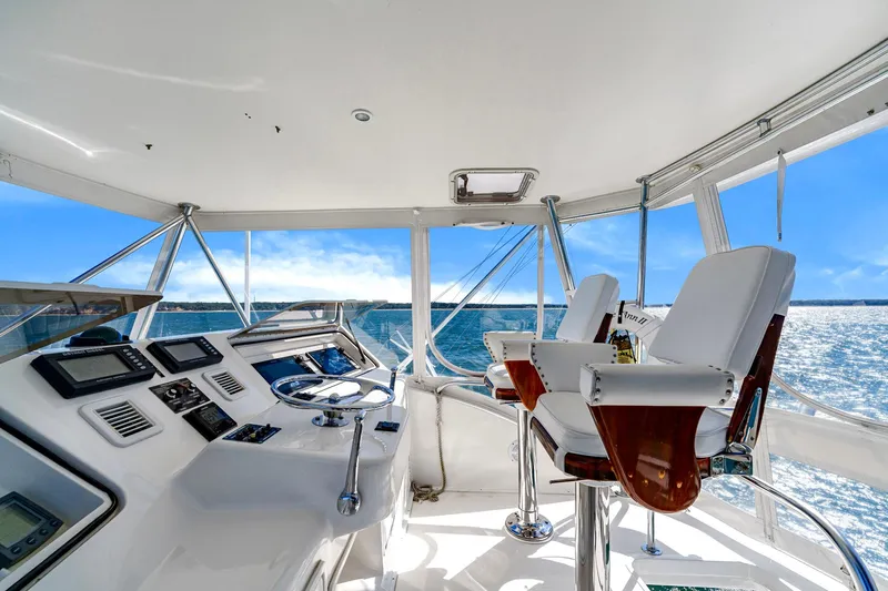 Sadie Ann II Yacht Photos Pics 2005 Ocean Yachts 50 Super Sport yacht interior with helm and ocean view.