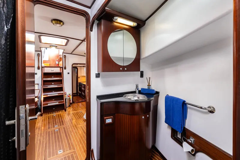 Zeta Yacht Photos Pics Luxurious 2009 Diesel Duck 41-Plus yacht interior with elegant wood finish and modern amenities.