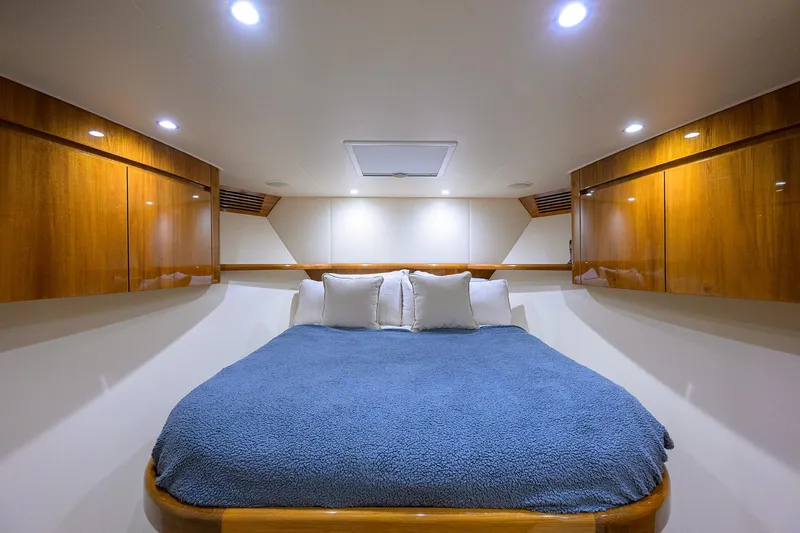 Osh-it Yacht Photos Pics Luxurious cabin interior of 2014 Viking 76 Enclosed Bridge Convertible yacht.