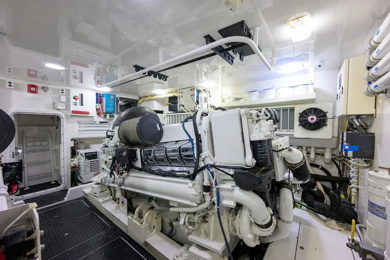 Osh-it Yacht Photos Pics Engine room of 2014 Viking 76 Enclosed Bridge Convertible yacht, showcasing machinery and equipment.