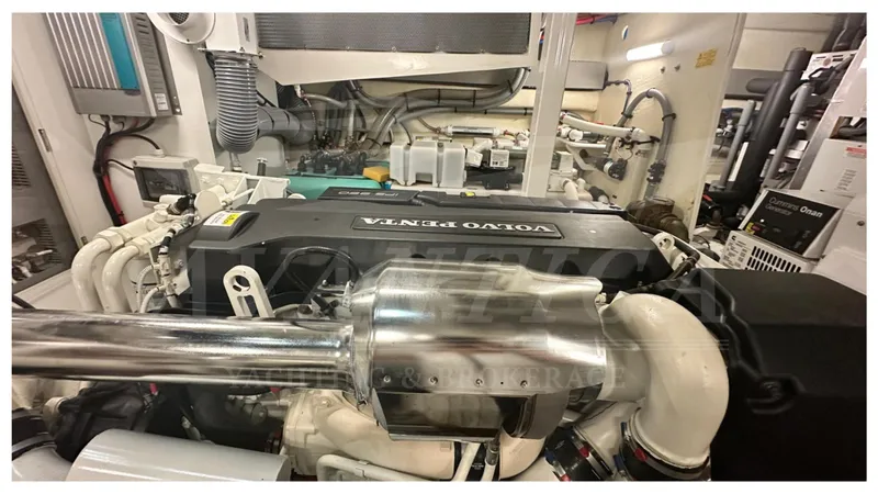  Yacht Photos Pics Engine room of a 2016 Prestige 620 yacht featuring a Volvo Penta engine.