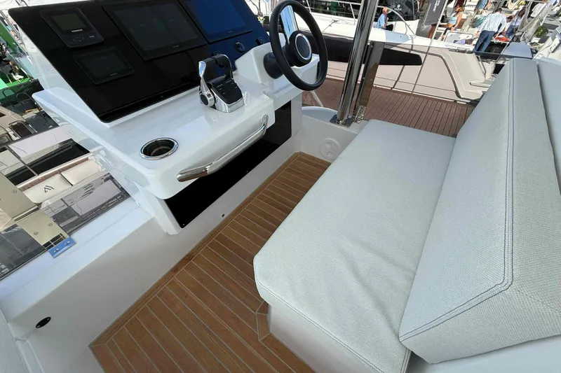  Yacht Photos Pics Helm station of 2026 Aventura 38 Motor Yacht with modern controls and seating.