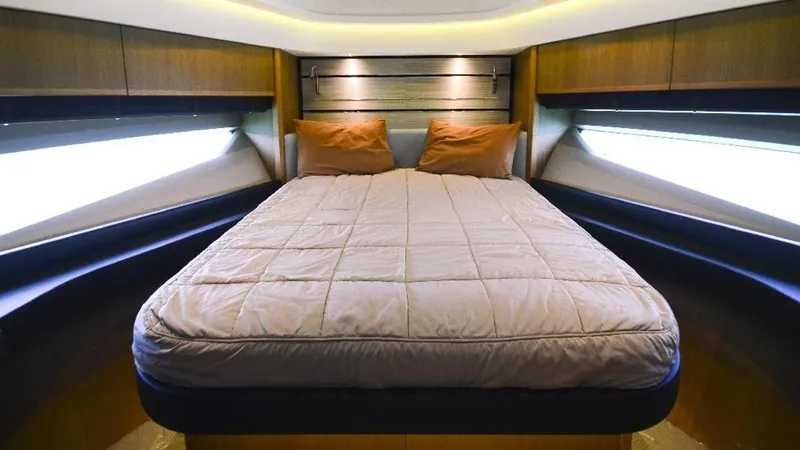  Yacht Photos Pics Luxurious bedroom interior of 2015 Princess S72 yacht with modern design and cozy bedding.