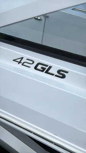  Yacht Photos Pics 2021 Cruisers Yachts 42 GLS boat exterior with model name displayed.