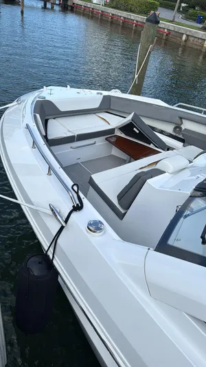  Yacht Photos Pics 2021 Cruisers Yachts 42 GLS docked, showcasing sleek design and spacious seating.