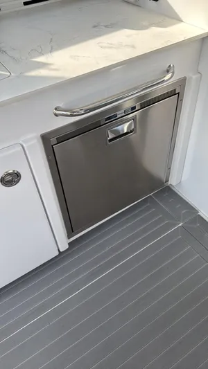  Yacht Photos Pics Stainless steel appliance on 2021 Cruisers Yachts 42 GLS with sleek countertop and flooring.