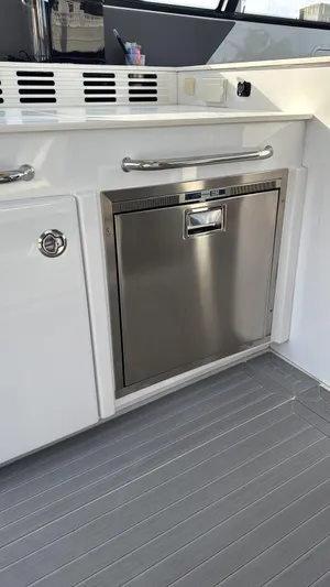  Yacht Photos Pics Stainless steel appliance on 2021 Cruisers Yachts 42 GLS boat interior.