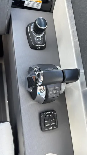  Yacht Photos Pics Control panel of 2021 Cruisers Yachts 42 GLS, featuring joystick and throttle controls.