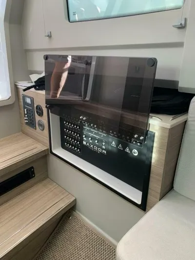  Yacht Photos Pics 2023 Saxdor 320 GTO interior control panel with modern design and wood accents.