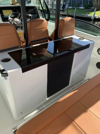  Yacht Photos Pics 2023 Saxdor 320 GTO boat interior with sleek seating and modern console design.