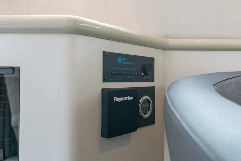 Too Many Options Yacht Photos Pics Control panel on 1993 Sea Ray 550 Sedan Bridge yacht interior.