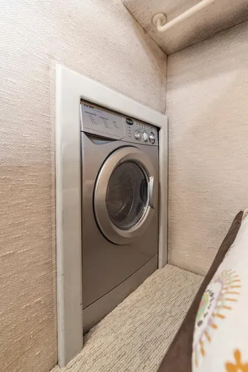 Too Many Options Yacht Photos Pics Built-in washing machine on a 1993 Sea Ray 550 Sedan Bridge yacht.