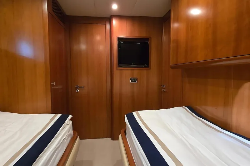M/y Balkan Yacht Photos Pics Luxurious wooden cabin interior with twin beds, Falcon 102 yacht, 2007 model.