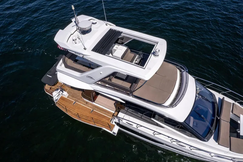 Mangogo Yacht Photos Pics 2021 Galeon 500 Fly yacht with spacious deck and modern design on open water.