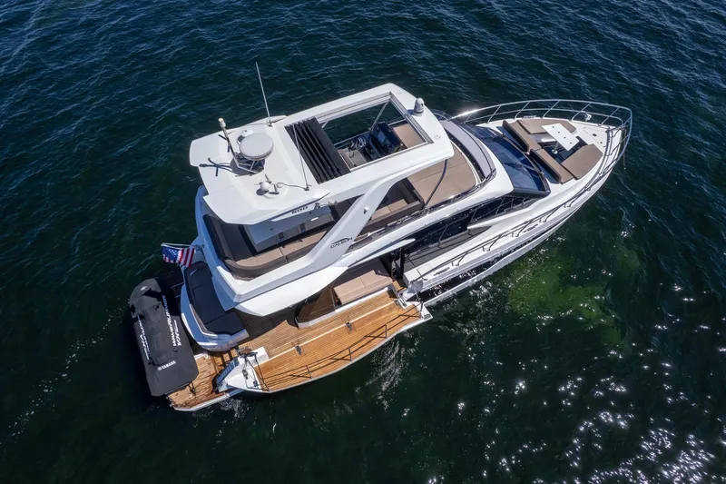 Mangogo Yacht Photos Pics Aerial view of 2021 Galeon 500 Fly yacht on open water.