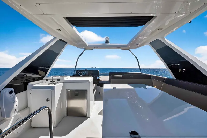 Mangogo Yacht Photos Pics 2021 Galeon 500 Fly yacht interior with sleek design, open sea view, and modern amenities.