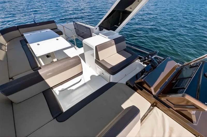 Mangogo Yacht Photos Pics Luxurious 2021 Galeon 500 Fly yacht interior with spacious seating and sleek design.